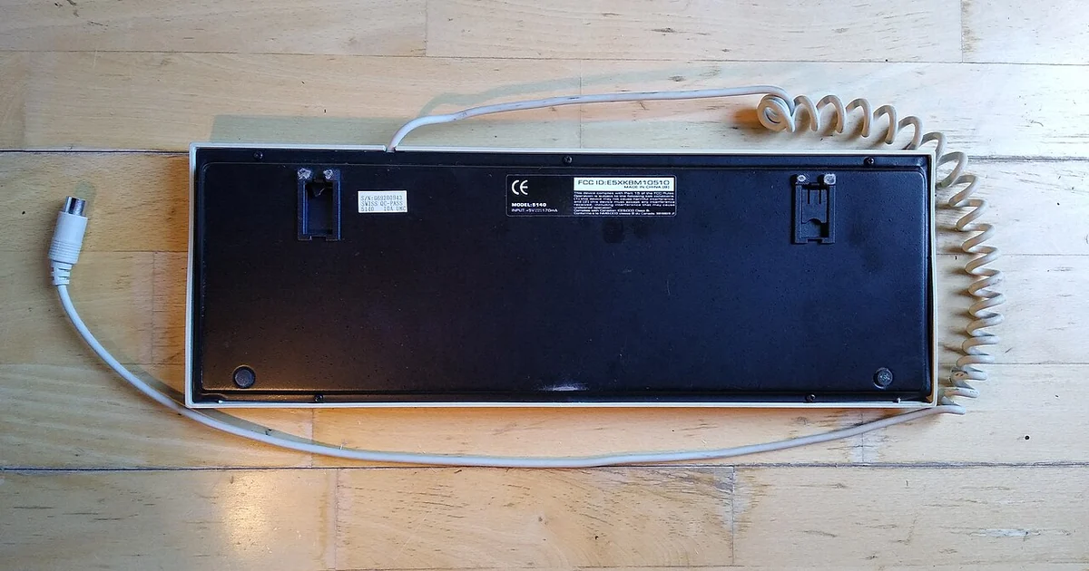 Back of Behavior Tech Computer keyboard model 5140 with CE logo, FCC ID, Swiss QC-Pass
